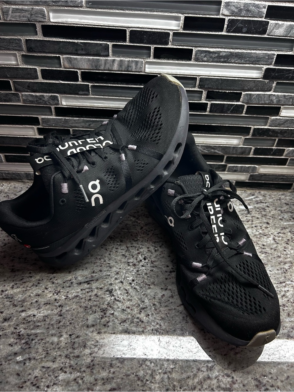 On Running Womens Cloudsurfer Sneakers in Black with Gray Accents size 9.5